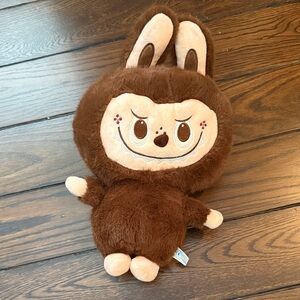 Brown and Cream Stuffed Animal Toy